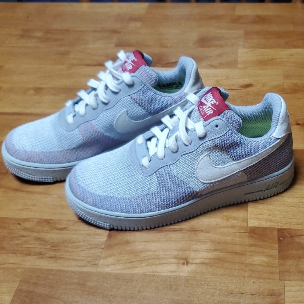 Nike Kids Light Gray White Sneakers with Red Tongue Accent